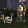 26" Light And Sound Rewind Skeleton Tombstone Halloween Decorative Prop - Hyde And EEK! Boutique™: Haunted Cemetery Decor -Hyde and EEK Shop GUEST 77966db8 70fb 4d8a bd9b 5ad95b9921ec