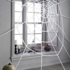 10' Black Light Responsive Giant Spiderweb White Halloween Decorative Prop - Hyde And EEK! Boutique™: Indoor/Outdoor Use