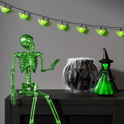24" Poseable Alien Skeleton Halloween Decorative Prop Ghoulish Glow Green - Hyde And EEK! Boutique™ 3 24" Poseable Alien Skeleton Halloween Decorative Prop Ghoulish Glow Green - Hyde And EEK! Boutique™