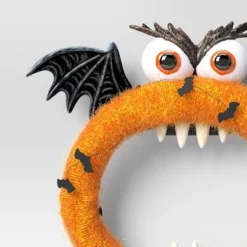 19.5" Animated Monster Wreath Halloween Decorative Prop Orange - Hyde And EEK! Boutique™ -Hyde and EEK Shop GUEST b8c1eeac ecd5 43a1 a48a bcaa72916f71
